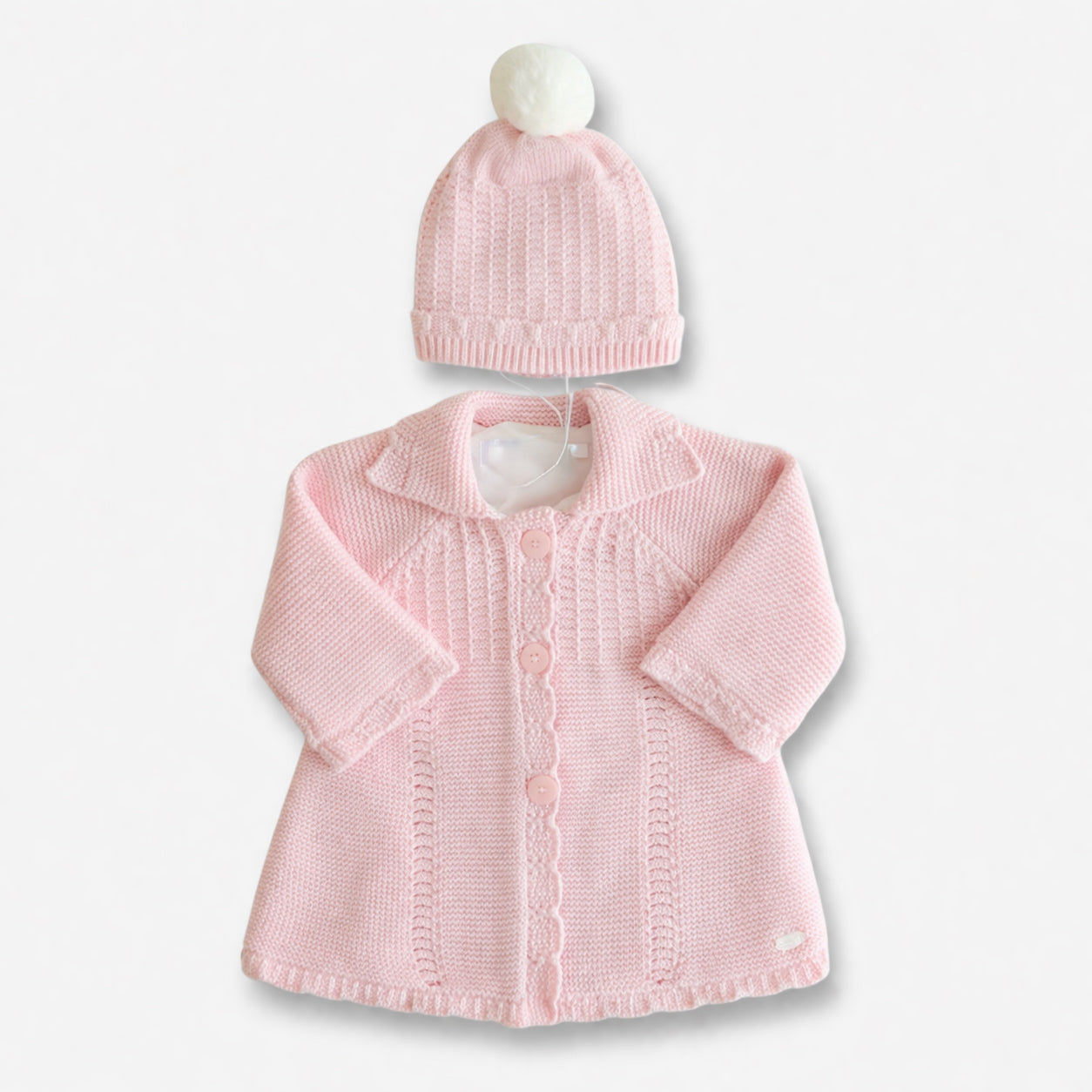 Conjunto gorro y abrigo tejido Español tono Rosa, pocas unidades.