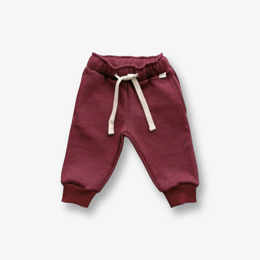 Pantalón grueso afranelado en tono burdeo