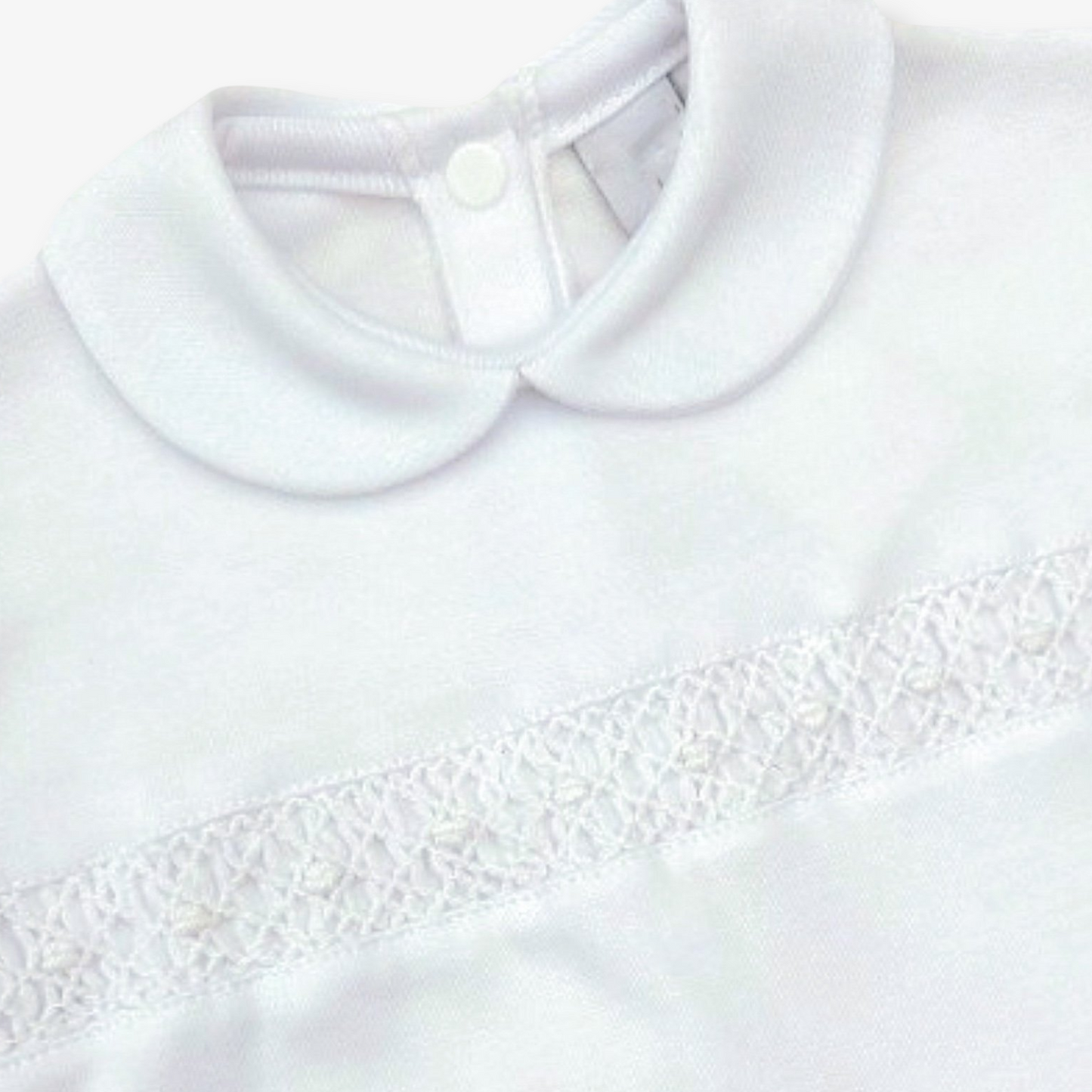 Enterito punto smock, con cuello.