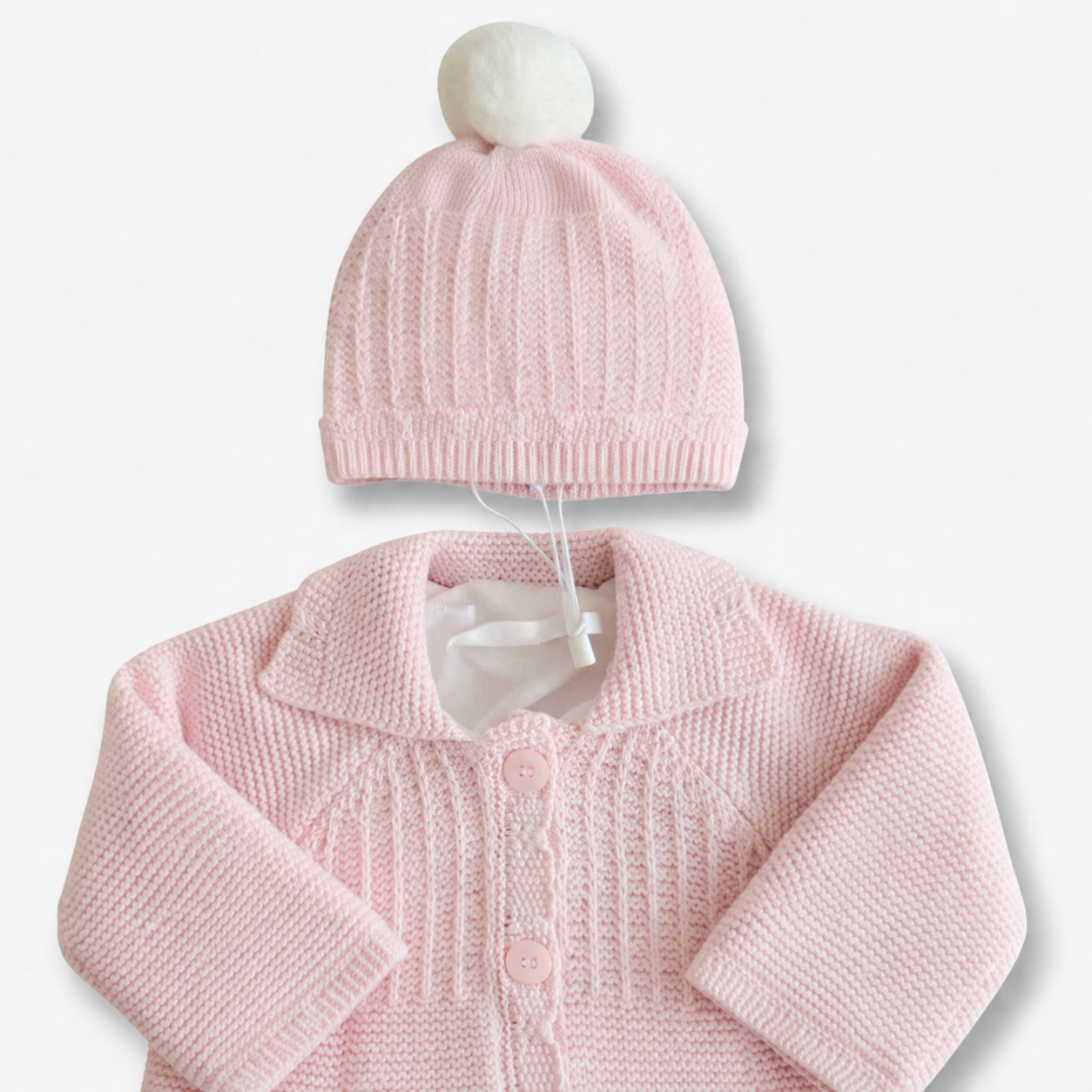 Conjunto gorro y abrigo tejido Español tono Rosa, pocas unidades.